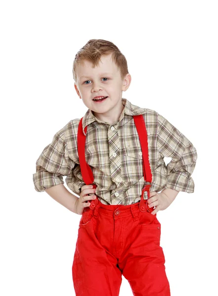 Little boy in red shorts — Stockfoto