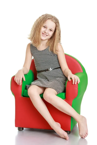 Beautiful girl on the chair — ストック写真