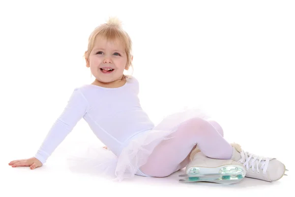 Little girl on skates — Zdjęcie stockowe