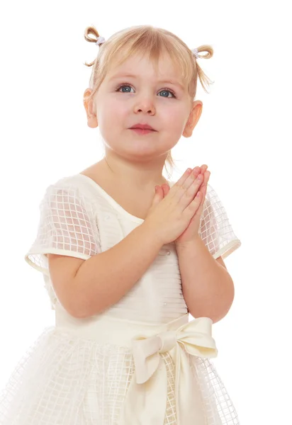 Girl in white dress gesticulating from Stock Photo