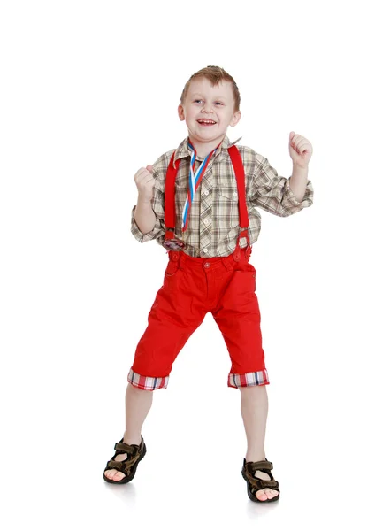 Boy in red pants — Stockfoto