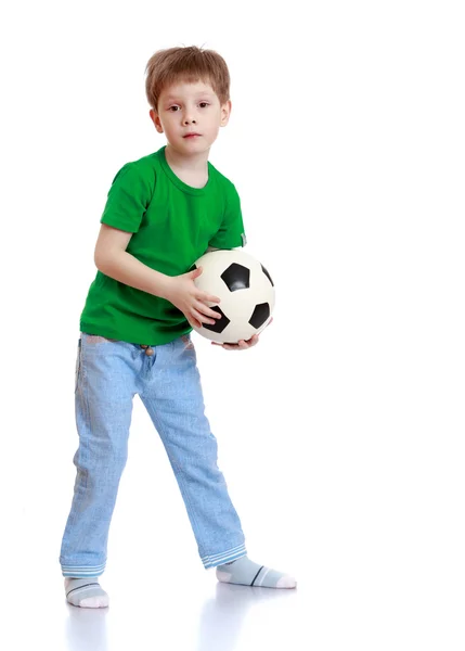 Little boy playing with a fire ball — 图库照片