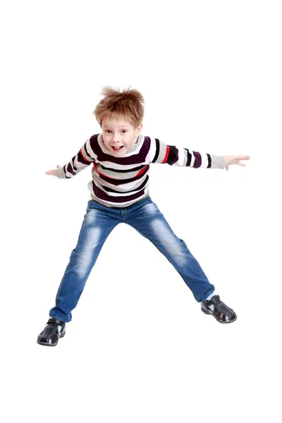 Хлопчик, стрибки — стокове фото