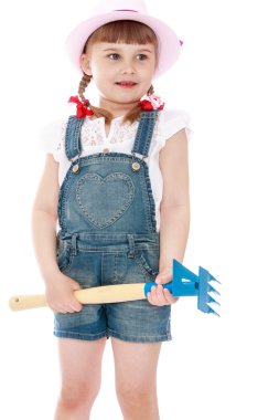 Girl with a rake