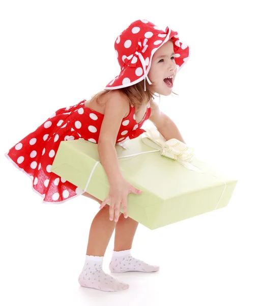 Little girl with gift — Stock Photo, Image