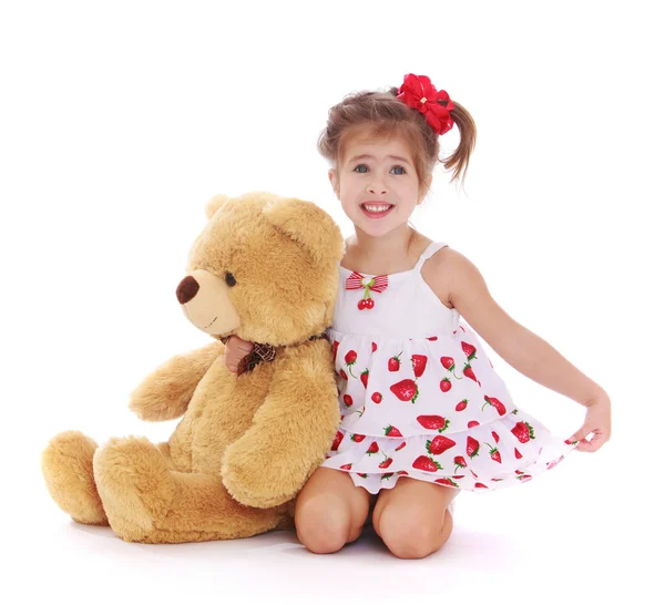 Girl with a Teddy bear — Stock Photo, Image