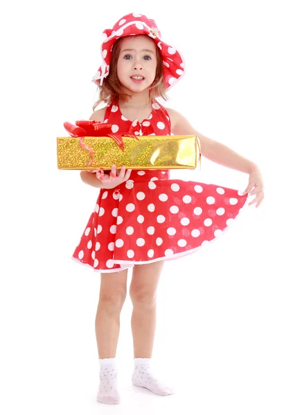 Little girl with gift — Stock Photo, Image