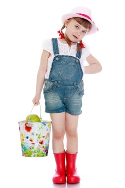 The girl with the bucket of apples