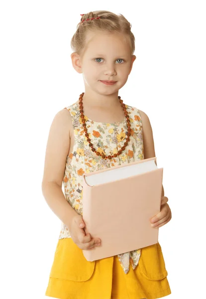 Little girl with a book — Stock Photo, Image