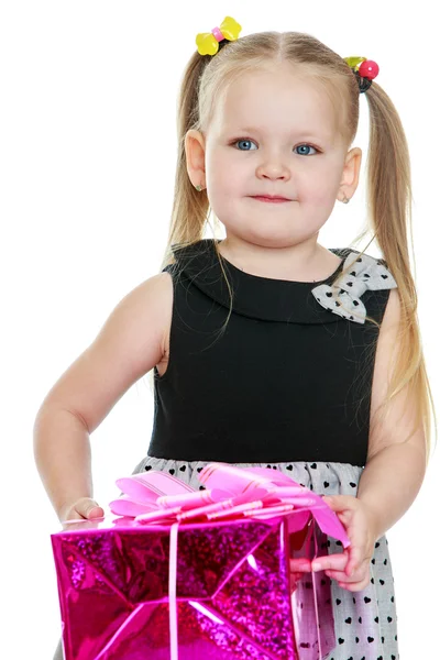 Girl holding a gift — Stock Photo, Image