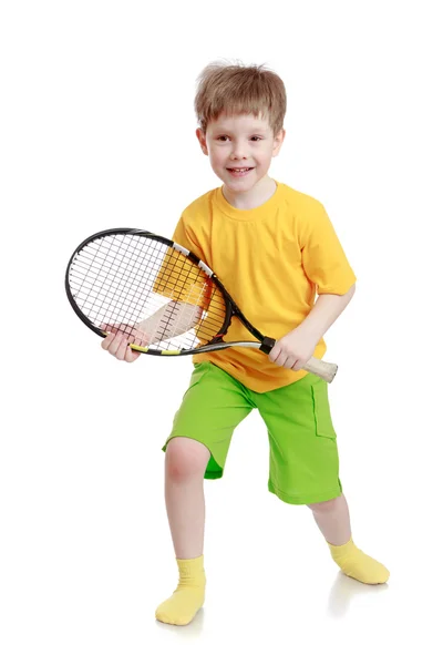 Niño sosteniendo una raqueta de tenis —  Fotos de Stock