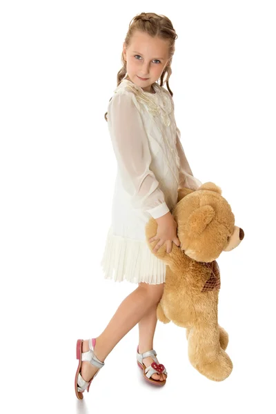 Девушка с мягкой игрушкой — стоковое фото