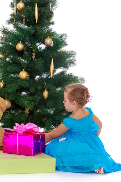 Elegant girl near the Christmas tree — Stock Photo, Image