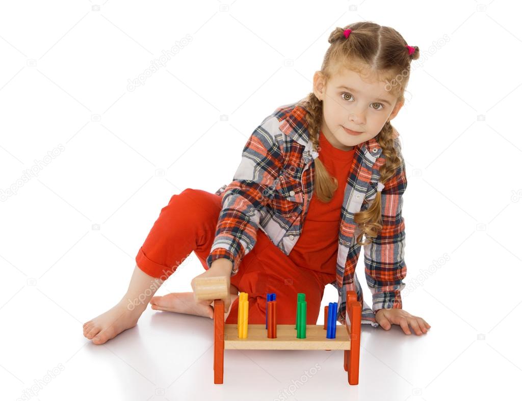 little girl in a Montessori environment