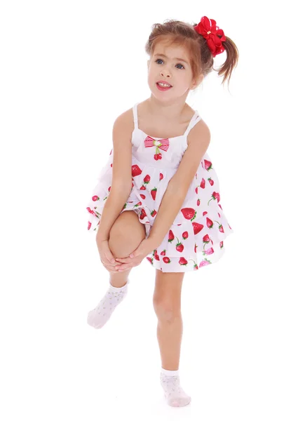 Little girl in a short dress — Stock Photo, Image