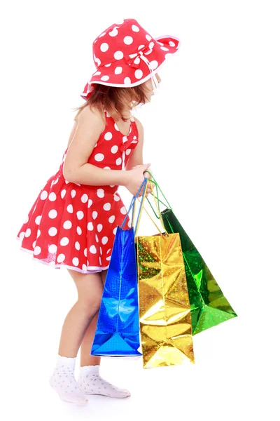 Cute little girl with a gift — Stock Photo, Image