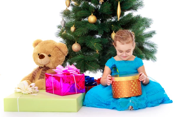 Elegant girl near the Christmas tree — Stock Photo, Image