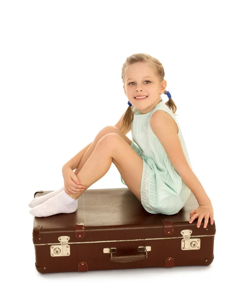 Little girl with suitcase — Stock Photo, Image