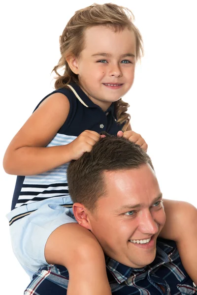 Girl sitting on dads neck — Stock Photo, Image