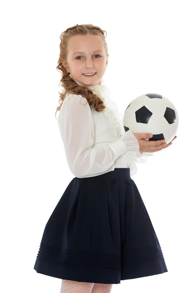 Studentessa con pallone da calcio — Foto Stock
