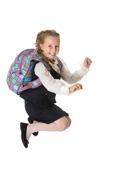 Girl schoolgirl jumps to the top — Stok fotoğraf