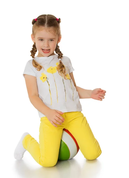 Little girl playing with a ball — Stock Photo, Image