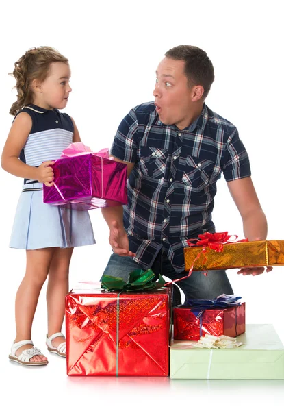 Dad gives daughter gifts — Stock Photo, Image