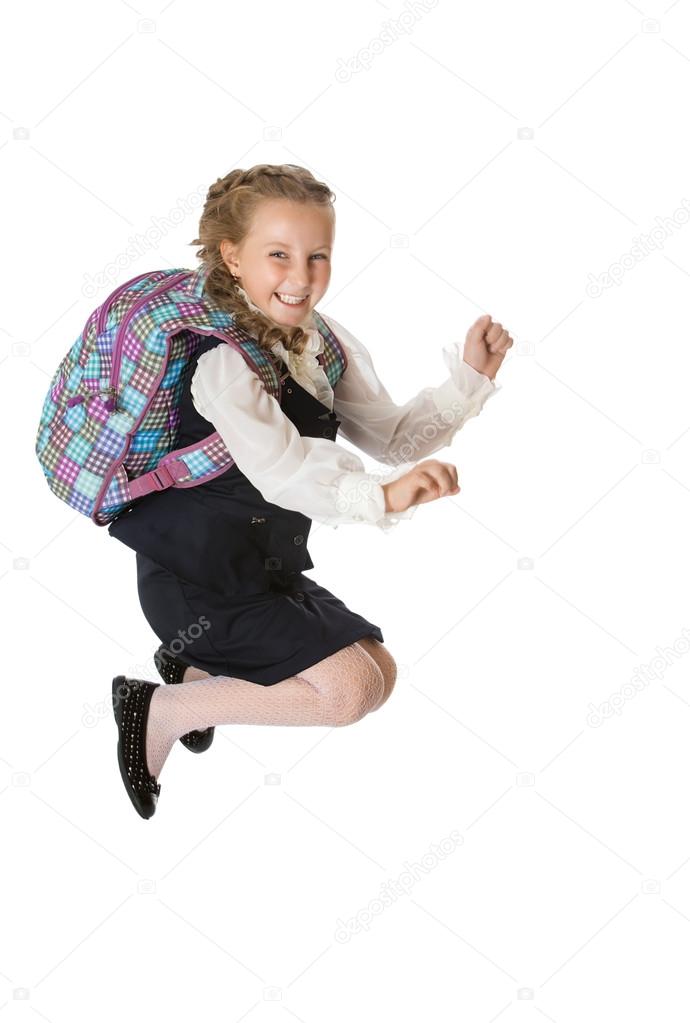 Girl schoolgirl jumps to the top