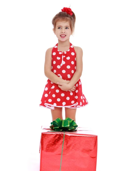 Little girl with a gift — Stock Photo, Image