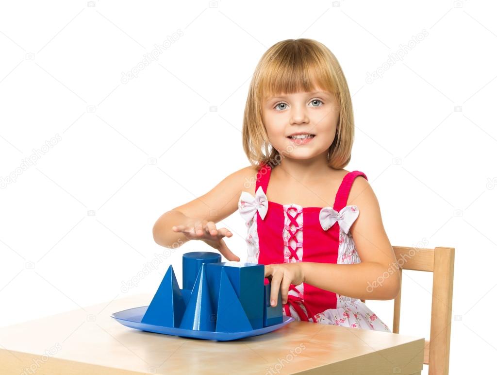 Girl playing at the table