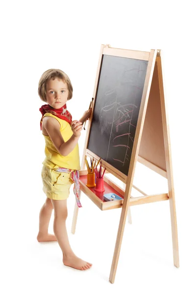 Dívka se kreslí na svou tabulku — Stock fotografie