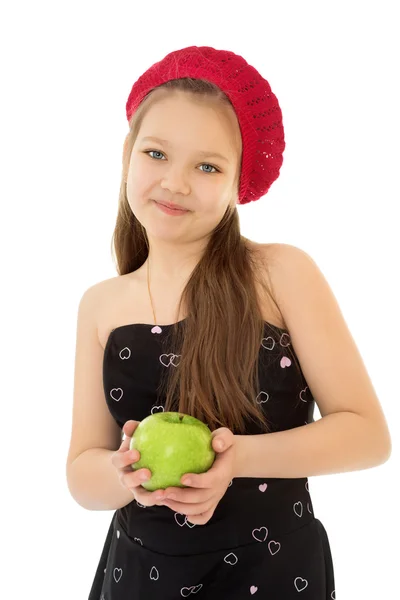 Menina segurando uma maçã — Fotografia de Stock