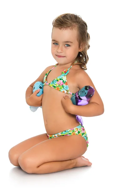 Leuk meisje in een zwembroek — Stockfoto