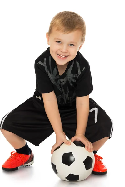 Junge mit Fußballball — Stockfoto