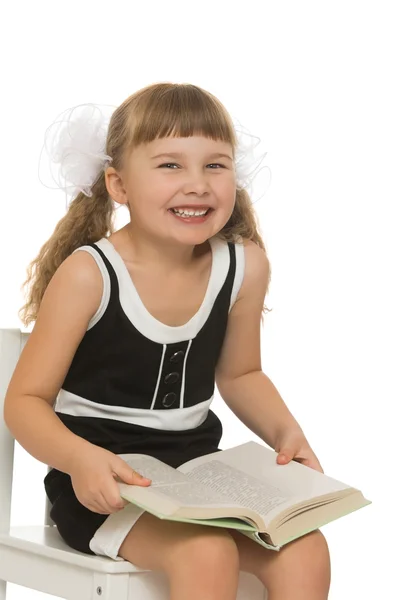 Little girl with a book — Stock Photo, Image