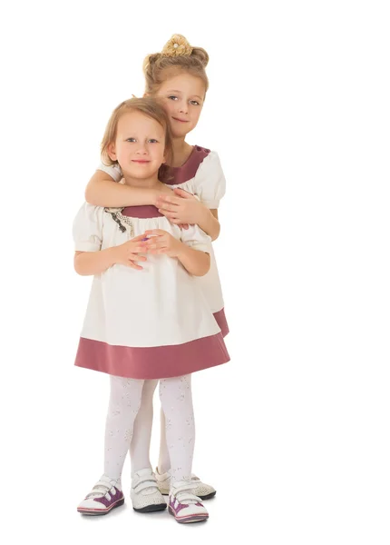 Sisters in matching dresses — Stock Photo, Image