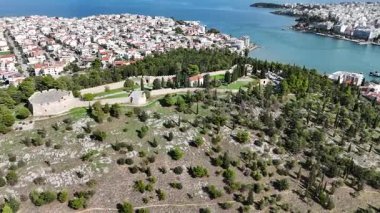 Aerial orbit shot circling Karababa Castle overlooking Chalkida and the Euripus Strait, Greece