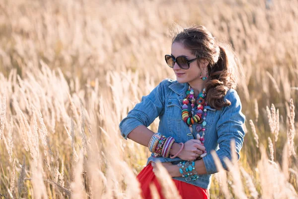 Portrait of attractive girl on the field — Stock Photo, Image