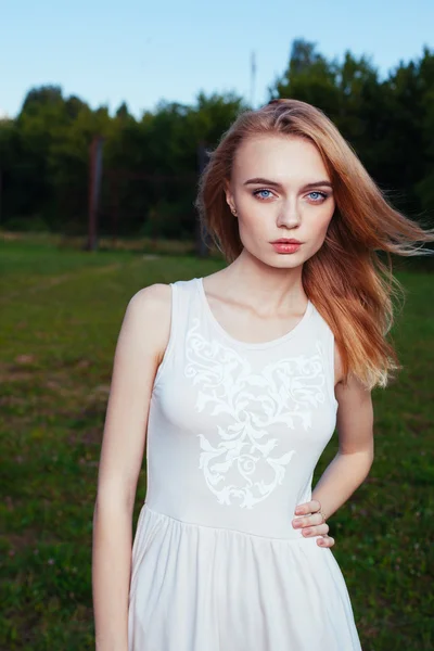 Beautiful blonde portrait in park — Stock Photo, Image