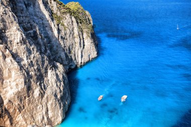 Coast of Zakynthos island with boats in Greece clipart