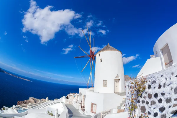 Oia village with windmill on Santorini island in Greece — Stock Photo, Image