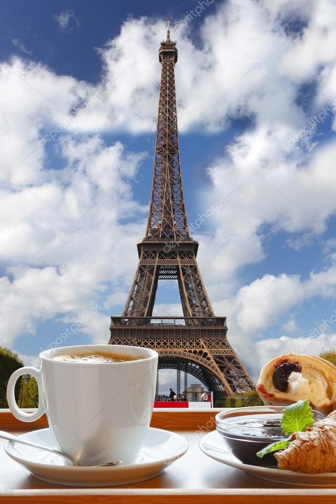 Coffee with croissants against Eiffel Tower in Paris, France