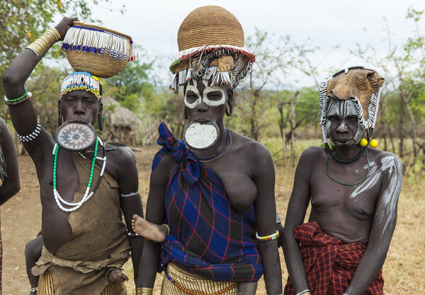 Women from Mursi tribe in Mirobey village. Mago National Park. Omo Valley. Ethiopia.