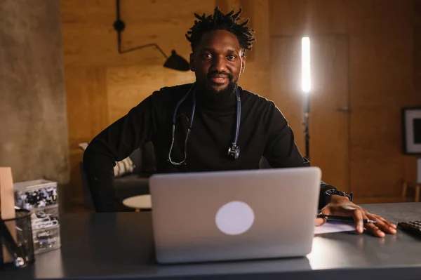 Black doctor. Telemedicine the use of computer and telecommunications technologies for the exchange of medical information