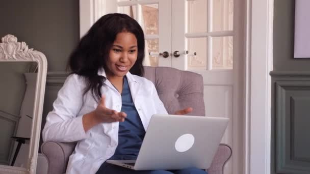 African female doctor talk with patient make telemedicine online webcam video call. Black woman therapist. Telehealth concept — Stock Video