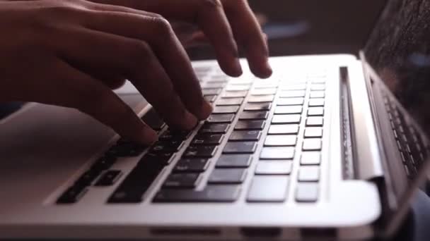 Male african american user hands typing on laptop keyboard sit at table, mixed race ethnic student professional study work with pc software technology, close up view — Stok Video