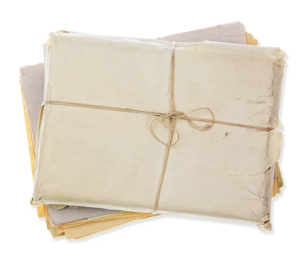 Old parcel isolated on white — Stock Photo, Image