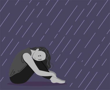 Üzgün, mutsuz bir kız oturuyor.