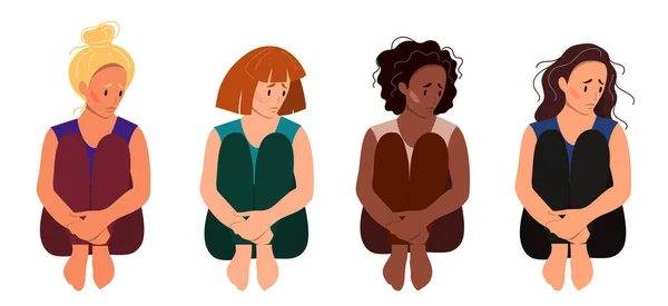 Üzgün kadın yerde oturuyor..