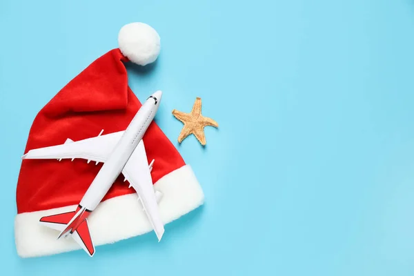 Santa Hat Toy Airplane Starfish Space Text Light Blue Background — Stock Photo, Image